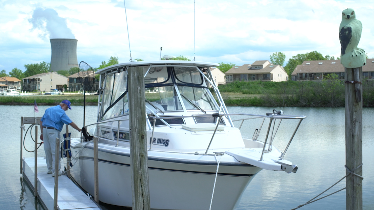 Lake Erie Charter Captain Dave Spangler, sanitizing his boat between clients. Photo by Great Lakes Now.
